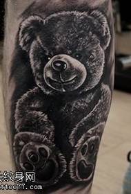 Motivo tatuaggio orsetto dai capelli piccoli
