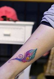 ຮູບ tattoo tattoo feather peacock ສີຂາ