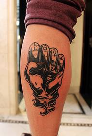 Tatuaggio polpaccio personalità pugno vento schizzo
