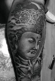 Uewerschenkel Stamm schwaarz a wäiss Buddha Statue Tattooen wert et hunn