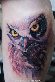 tatouage hibou aquarelle sur le mollet