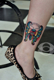 Fra Been Moud schéi Moth Tattoo