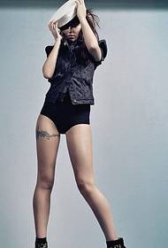 tatuaggio totem gamba ragazza