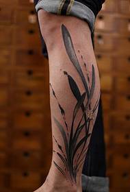 gamba tatuaggio tradizionale stile cinese orchidea