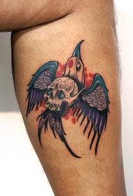 łydkowy alternatywny tatuaż małego ptaka
