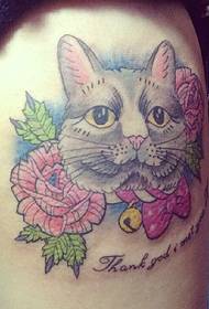 Awesome thigh flower cat head tattoo