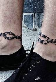 le gambe degli uomini di marea hanno immagini creative del tatuaggio a catena