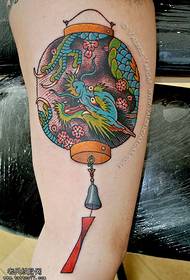 I-Thigh dragon lantern tattoo iphethini