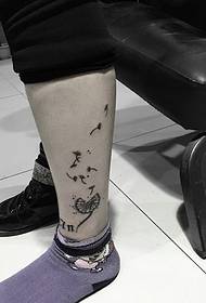 small dandelion leg tattoo fresh and natural