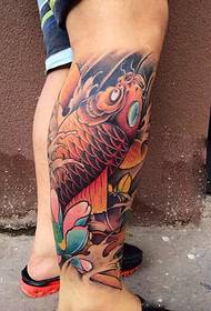 small energy squid tattoo that falls on the calf