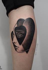 Motif de tatouage visage pêche noire sur le mollet