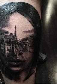 小腿面部的城市纹身图案