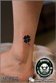 Classic four-leaf clover tattoo pattern