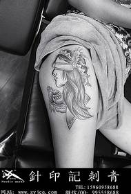 Tatouage belle cuisse