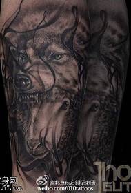 Wolf and sheep tattoo pattern on thigh
