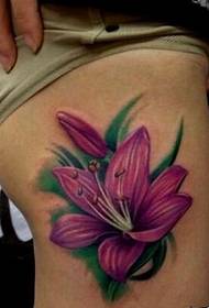 Smuk og smuk farverig lilje tatovering billede billede af piger ben