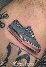 Shoe tattoo pattern on calf