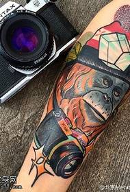 Modello di tatuaggio gorilla fotografo