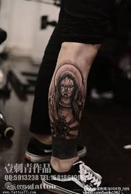 Szent Szűz tetoválás a borjú