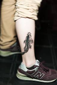 Bellu tatuu di calamar di tinta