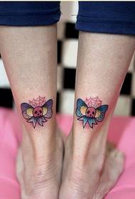 Beautiful legs with nice colorful bows and tattoo pictures