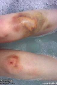 Modello di tatuaggio di colore delle gambe
