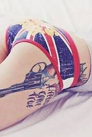 美美麗的雙腿手槍紋身圖片圖片