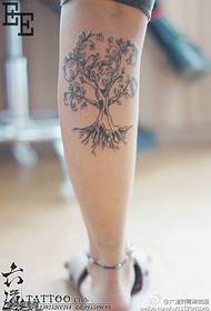 Pernice un arbulu lussureggiante di tatuaggi di vita