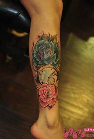 Rose flower and clock leg tattoo pictures