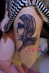 Immagine del tatuaggio della coscia del ritratto del vento di arte