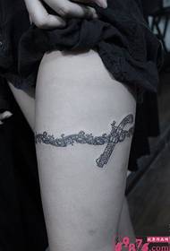 Leg flower vine line pistol tattoo picture