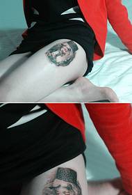 Graži šlaunies mergaitės graži tatuiruotės nuotrauka