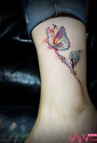 Maalattu perhonen tatuointi kuva