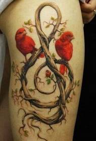 Immagine del tatuaggio dell'uccello del personaggio di musica della radice dell'albero di modo delle gambe di bellezza bella