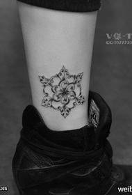 Abstract crystal snowflake tattoo qauv