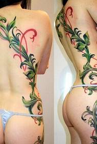 Seksikäs alaston nainen takaisin jalkoihin värikäs viiniköynnösten tatuointikuva