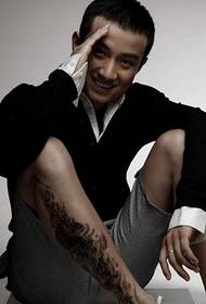Foto e tatuazhit të trupit të djathtë të trupit të dragoit të kokës së kalit
