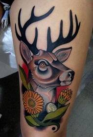 a classic deer tattoo on the leg