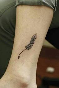 Daim duab nplej pob txha hlauv nplej tattoo daim duab