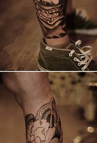 Traditional peony flower shank tattoo picture