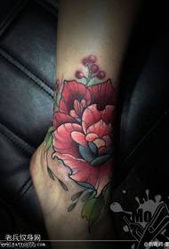 Foto di tatuaggi rosa scuola di colore delle gambe