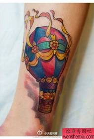 Amaphethini we-hot air balloon tattoo athandwa emilenzeni yamantombazane