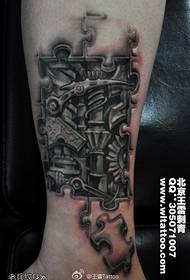 Tattoo rekòmande yon janm mekanik tatoo