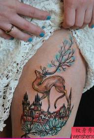 Woman legs colored antelope tattoo pattern by tattoo show map