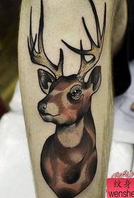 a leg colored antelope tattoo pattern