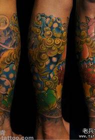 Cool colored tan lion tattoo pattern for male legs