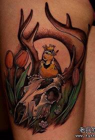 Woman colored leg antelope tattoo work