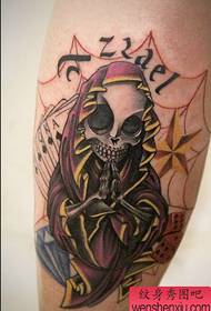 a leg tattoo of death