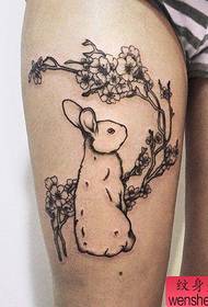 Tatoeage show, beveel een poot konijn tattoo