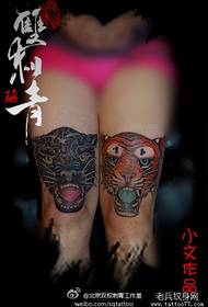 Ang pattern sa tattoo sa ulo sa tigre ug leopardo alang sa mga bitiis sa mga batang babaye